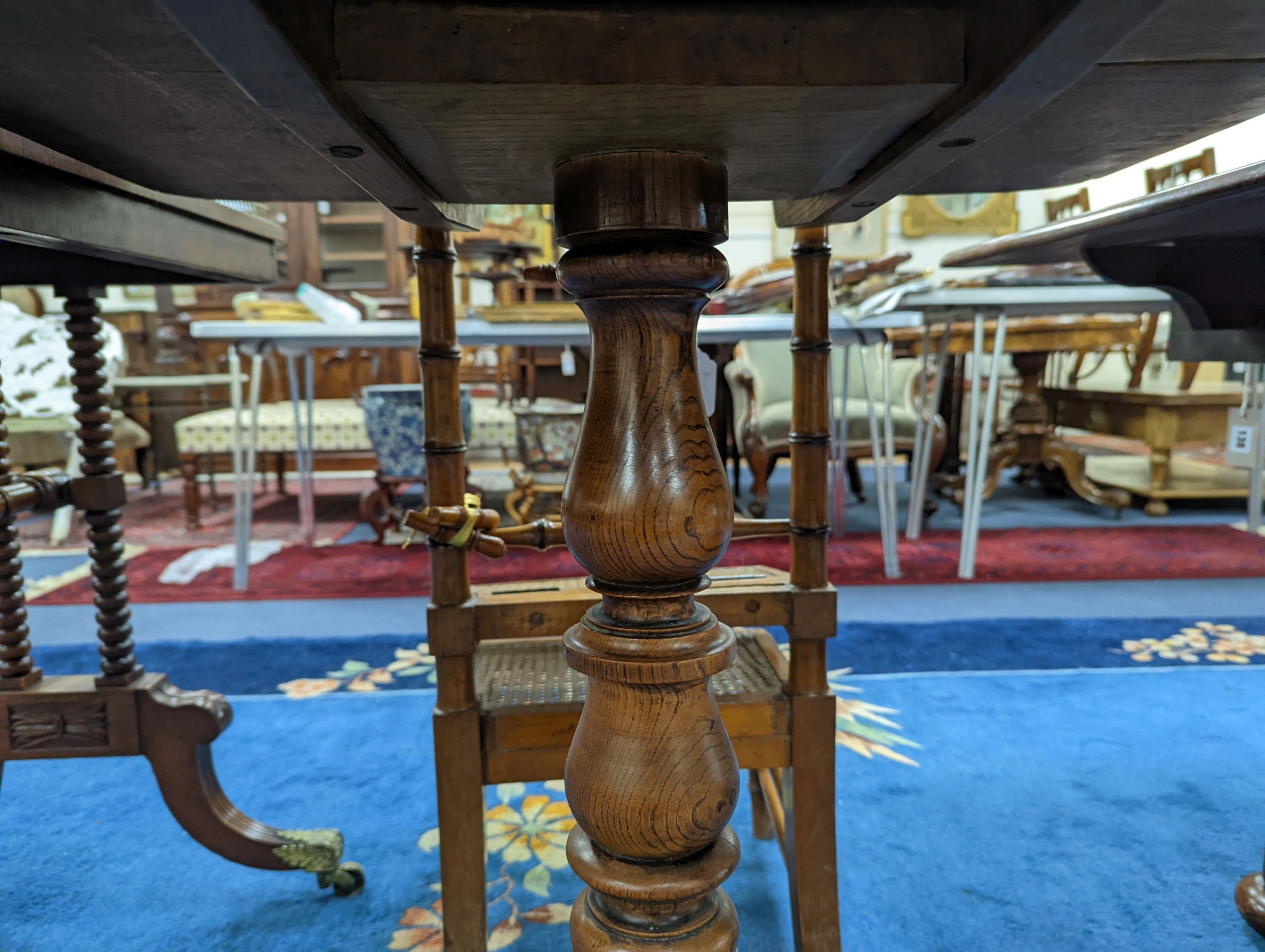 A Victorian rectangular oak tilt top tripod tea table, width 67cm, depth 56cm, height 74cm